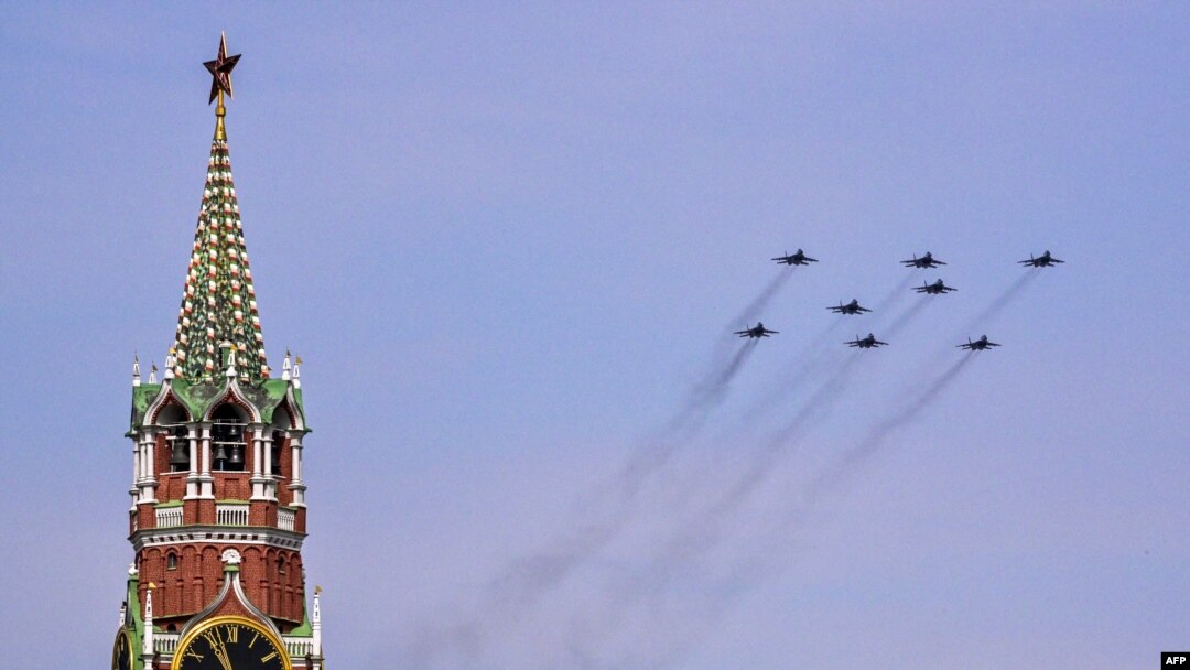 Russian MiG-29SMT jet fighters forming the symbol "Z" in support of Russian military action in Ukraine, fly over Red Square during the general rehearsal of the Victory Day military parade in central Moscow on May 7, 2022.