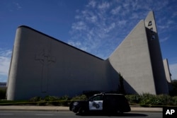 A patrol vehicle is seen outside Geneva Presbyterian Church in Laguna Woods, Calif., May 15, 2022, after a fatal shooting.