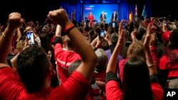 Labor Party leader Anthony Albanese, center back, speaks to supporters at a Labor Party event in Sydney, Australia, May 22, 2022.