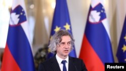 FILE - Winner of Parliamentary elections Robert Golob addresses a news conference in Ljubljana, Slovenia, Apr. 26, 2022. 