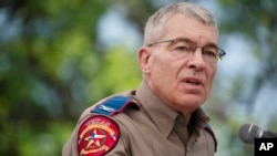 Texas Department of Public Safety Director Steven McCraw speaks at Robb Elementary School, May 27, 2022, in Uvalde, Texas. He said police responding to the shooting at Robb stayed out of a classroom where the shooter was because they believed students were no longer at risk. 