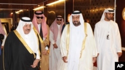 FILE - In this image made available by Emirates News Agency, WAM, UAE President Sheikh Khalifa bin Zayed Al Nahyan, 2nd right, walks with Saudi Arabia's Prince Nayef bin Abdul Aziz during the 31st Gulf Cooperation Council, GCC summit in Abu Dhabi, Dec. 6, 2010.