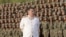 Pemimpin Korea Utara Kim Jong Un bertemu dengan pasukan yang ikut serta dalam parade militer untuk memperingati ulang tahun ke-90 berdirinya Tentara Revolusioner Rakyat Korea. (Foto: KCNA via Reuters)