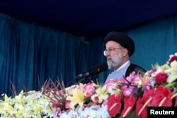 FILE - Iranian President Ebrahim Raisi delivers a speech in Tehran, Iran on April 18, 2022.