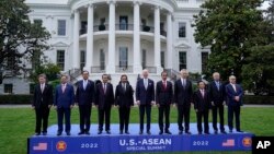 President Joe Biden and leaders from the Association of Southeast Asian Nations (ASEAN) participate in a group photo on the South Lawn of the White House in Washington, May 12, 2022. 