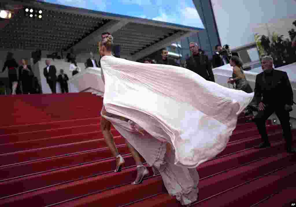 Natasha Poly poses for photographers upon arrival at the 75th anniversary celebration of the Cannes film festival and the premiere of the film &#39;The Innocent&#39; at the 75th international film festival, Cannes, southern France.