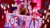 Jacqueline Von Edelbe holds a sign with other abortion rights demonstrators May 14, 2022, in Chicago.