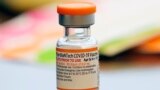 FILE - A vial of the Pfizer-BioNTech COVID-19 vaccine for children 5 to 12 years old sits ready for use at a vaccination site in Fort Worth, Texas, Nov. 11, 2021. Kids ages 5 to 11 should get a booster dose of Pfizer’s COVID-19 vaccine, advisers to the U.