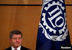 FILE - Director-General of the International Labour Organization (ILO) Guy Ryder attends the 108th ILO International Labour Conference at the United Nations in Geneva, Switzerland, June 10, 2019.