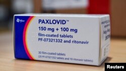 FILE PHOTO: A box of Pfizer's COVID-19 treatment pill, named Paxlovid, at Misericordia hospital in Grosseto, Italy, February 8, 2022. 