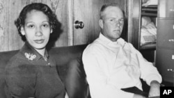 FILE - This January 26, 1965 file photo shows Mildred Loving and her husband, Richard P. Loving.  Bernard S. Cohen, who successfully challenged a Virginia law banning interracial marriage.