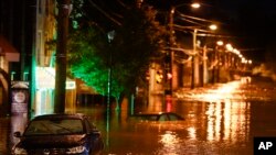 FILE - The Manayunk neighborhood in Philadelphia is flooded Thursday, Sept. 2, 2021, in the aftermath of downpours and high winds from the remnants of Hurricane Ida.