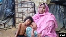 Noor Jahan and her daughter at an unidentified Rohingya village in Bangladesh, Dec. 28, 2016. (Saiful Islam for VOA)