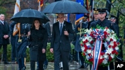 Vice President Kamala Harris and Veterans Affairs Secretary Denis McDonough arrive at Arlington National Cemetery for the National Veterans Day Observance, in Arlington, Virginia, Nov. 11, 2022.