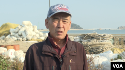 Cha Jae-geun, who heads a society of local fishermen, says his livelihood has become more difficult as both Koreas fire weapons nearby, in Yeonpyeong, Nov. 8, 2022. (Kim Hyungjin/VOA)