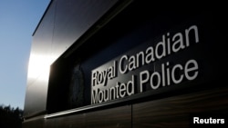 FILE - The British Columbia Royal Canadian Mounted Police headquarters in Surrey, British Columbia, Dec. 5, 2017. A retired RCMP officer was charged July 21, 2023, with foreign interference.