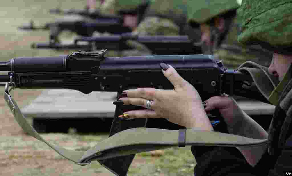 Military volunteers and civilians go through training at a shooting range in Rostov region amid the ongoing Russian military action in Ukraine.