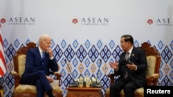 U.S. President Joe Biden meets with 2022 ASEAN Chair and Cambodia's Prime Minister Hun Sen at the ASEAN summit in Phnom Penh, Cambodia, November 12, 2022.
