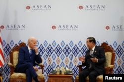 FILE - U.S. President Joe Biden meets with 2022 ASEAN Chair and Cambodia's Prime Minister Hun Sen at the ASEAN summit in Phnom Penh, Cambodia, November 12, 2022.