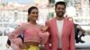 FILE - Actor Alina Khan, left, and director Saim Sadiq attend a photo call for the film "Joyland" at the 75th edition of the Cannes Film Festival in Cannes, southern France, on May 22, 2022. 