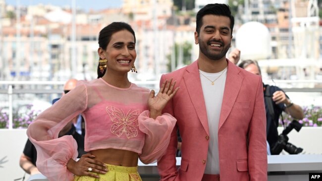 FILE - Actor Alina Khan, left, and director Saim Sadiq attend a photo call for the film