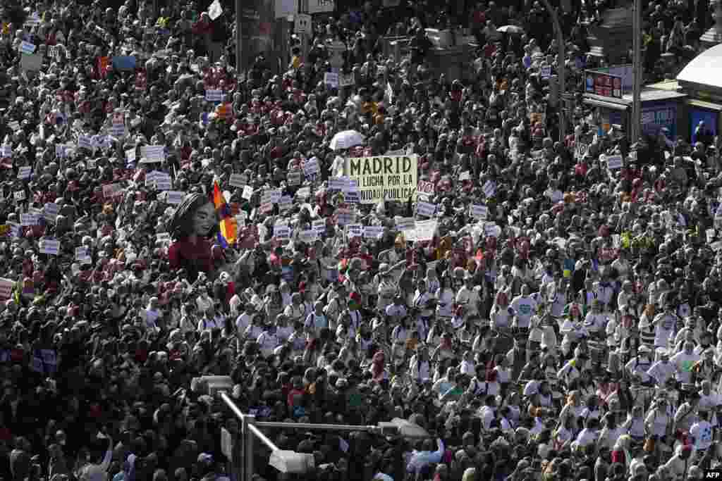 Hundreds of thousands of protesters march during a demonstration called by citizens under the slogan &quot;Madrid stands up for its public health. Against the destruction of primary health care&quot; in Madrid, Spain.