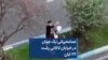 عمامه‌پرانی یک جوان در خیابان لاکانی رشت ۲۲ آبان