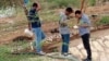 Researchers studying a malaria outbreak in Dire Dawa, Ethiopia, search for invasive Anopheles stephensi mosquitoes. (Tadele Emiru photo)