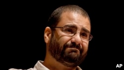 FILE - Egypt's leading pro-democracy activist Alaa Abdel-Fattah speaks during a conference at the American University in Cairo, Egypt, on Sept. 22, 2014. 