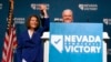 Sen. Catherine Cortez Masto, D-Nev., left, reacts alongside Nevada Gov. Steve Sisolak during an election night party hosted by the Nevada Democratic Party, Nov. 8, 2022, in Las Vegas. 
