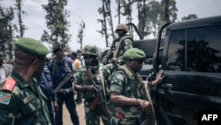 L'armée congolaise a défilé mardi dans Goma pour "rassurer" la population de la capitale provinciale du Nord-Kivu, dans l'est de la RDC, au lendemain d'une manifestation violente contre la force est-africaine accusée d'inaction face aux rebelles du M23.