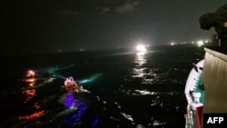 Garda Pantai Korea Selatan sedang mencari 12 anak buah kapal nelayan Korea yang tenggelam di perairan Pulau Jeju, Jumat, 8 November 2024. (Foto: Garda Pantai Jeju/AFP)