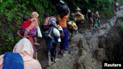 Refugiados Rhongya a caminhodo bangladesh