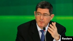 FILE - Brazilian Finance Minister Joaquim Levy will "very likely leave" the government after passage of a fiscal austerity plan, a Workers' Party lawmaker says. "He is very frustrated and under a lot of pressure."