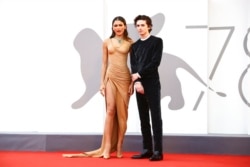 Zendaya dan Timothee Chalamet di acara karpet merah film "Dune" sebagai bagian dari festival film Venice 2021 di Italia (dok: Joel C Ryan/Invision/AP)