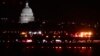 Emergency vehicles stage at Ronald Reagan Washington National Airport, Jan. 29, 2025, in Arlington, Va. The U.S. Capitol is seen across the Potomac River in Washington.