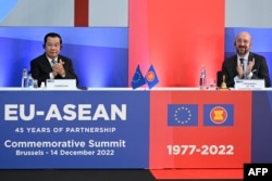 President of the European Council Charles Michel (R) and Cambodia's Prime minister Samdech Techo Hun Sen take part in the EU-ASEAN (Association of Southeast Asian Nations) summit at the European Council headquarters in Brussels on December 14, 2022.