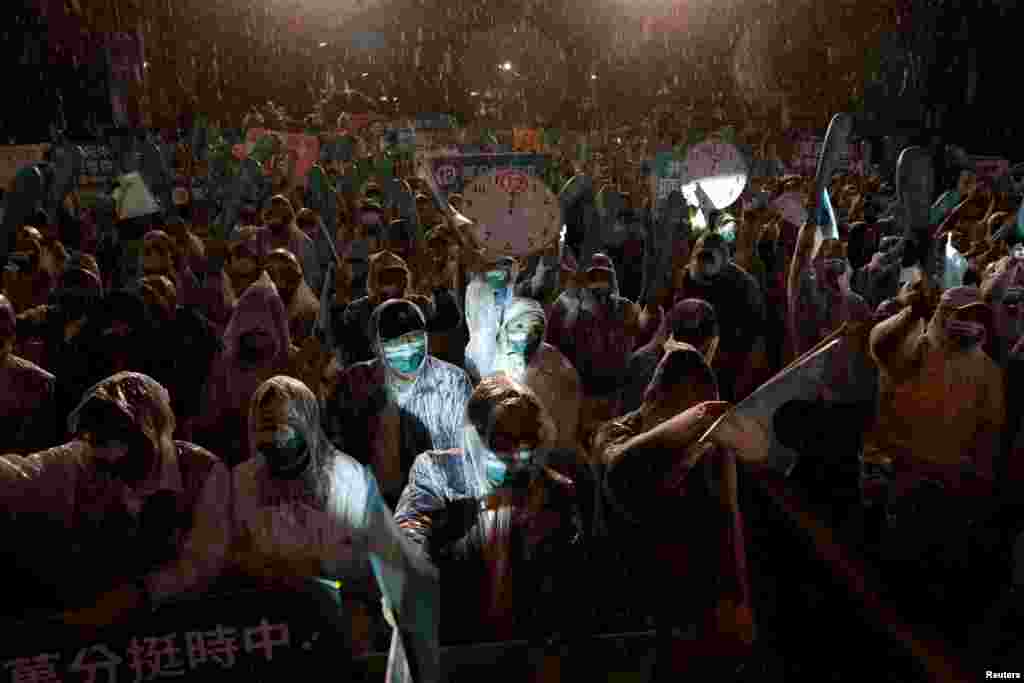 Supporters of the Democratic Progressive Party (DPP) attend a campaign rally ahead of the local elections, in Taipei, Taiwan.