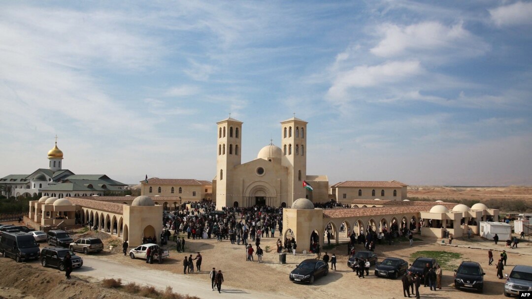 Catholic pilgrims attend a mass at the Church of the Baptism of Christ, near the site of Al-Maghtas, where Jesus is believed by Christians to have been baptised by Saint John, in the Jordan river valley, Jan. 13, 2023.
