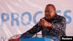 Former Kenyan President and the East African Community's facilitator Uhuru Kenyatta addresses delegates dealing with the peace talks on the eastern region of the Democratic Republic of the Congo, in Nairobi, Kenya, Dec. 6, 2022. 