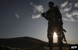 ایک کرد پیش مرگا جنگجو۔ فوٹو اے ایف پی