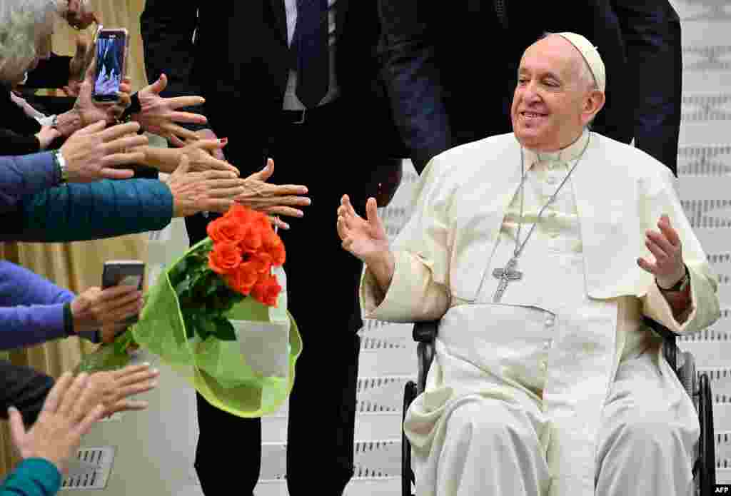 Pope Francis meets people during the weekly general audience in Paul VI hall at the Vatican.