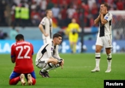 Germany's Kai Havertz looks dejected after his team won the match against Costa Rica but was eliminated from the World Cup, at Al Bayt Stadium, Al Khor, Qatar, Dec. 1, 2022.