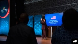 Vice President Kamala Harris waves after speaking to the African Diaspora Young Leaders Forum, in Washington, Tuesday, Dec. 13, 2022. 