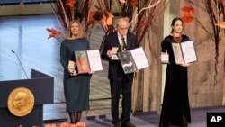 FILE: Representatives of the 2022 Nobel Peace Prize laureates, from left: Natalia Pinchuk, the wife of winner Ales Bialiatski, Yan Rachinsky, chairman of the International Memorial Board and Oleksandra Matviychuk, head of the Ukraine's Center for Civil Liberties. Dec. 10, 2022.