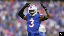 FILE - Buffalo Bills player Damar Hamlin reacts after a play during an NFL football game against the Pittsburgh Steelers, Oct. 9, 2022, in Orchard Park, N.Y.