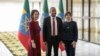 German Foreign Minister Annalena Baerbock (L), Ethiopian Prime Minister Abiy Ahmed (C) and French Foreign Minister Catherine Colonna (R) pose for a photograph at the Prime Minister's office in Addis Ababa, Ethiopia, Jan. 12, 2023.