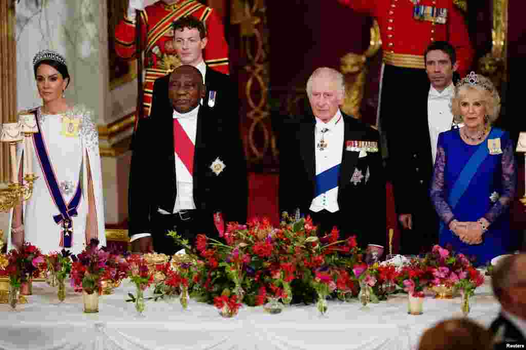 (from left to right) The Princess of Wales, President Cyril Ramaphosa of South Africa, King Charles III and the Queen Consort, stand during the State Banquet held at Buckingham Palace, London, Nov. 22, 2022.