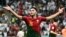 Portugal's Goncalo Ramos celebrates after scoring his third goal and his team's fifth during the Qatar 2022 World Cup round of 16 soccer match against Switzerland at Lusail Stadium north of Doha on Dec. 6, 2022.