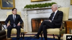 U.S. President Joe Biden meets Japanese Prime Minister Fumio Kishida in the Oval Office of the White House, Jan. 13, 2023, in Washington.